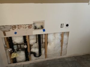 Drain and vent rough-in in an opened wall